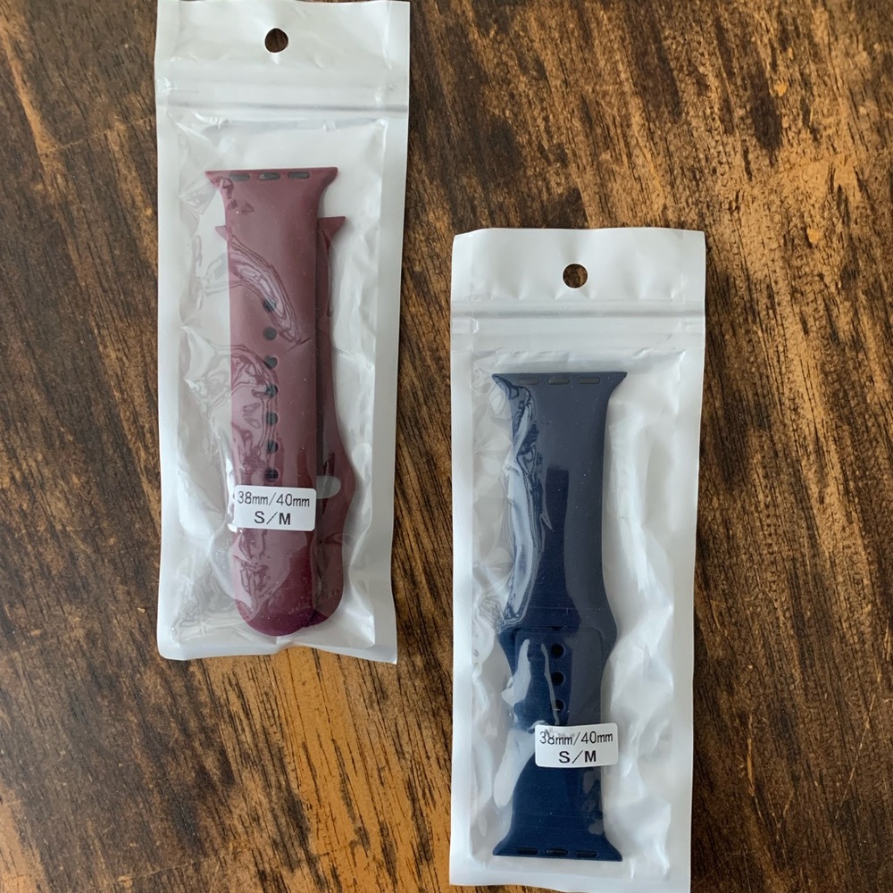 Never used/ Still packaged Apple Watch Bands (plum and dark blue)